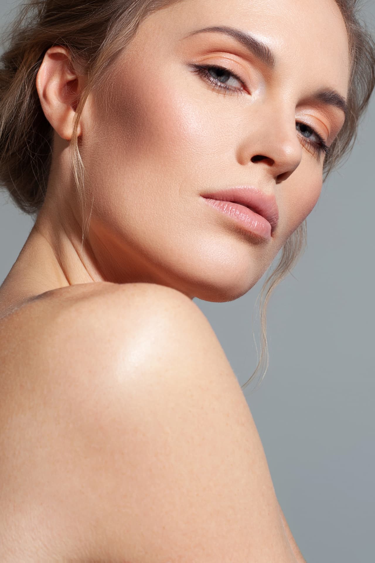 Portrait of a woman with luminous, even skin
